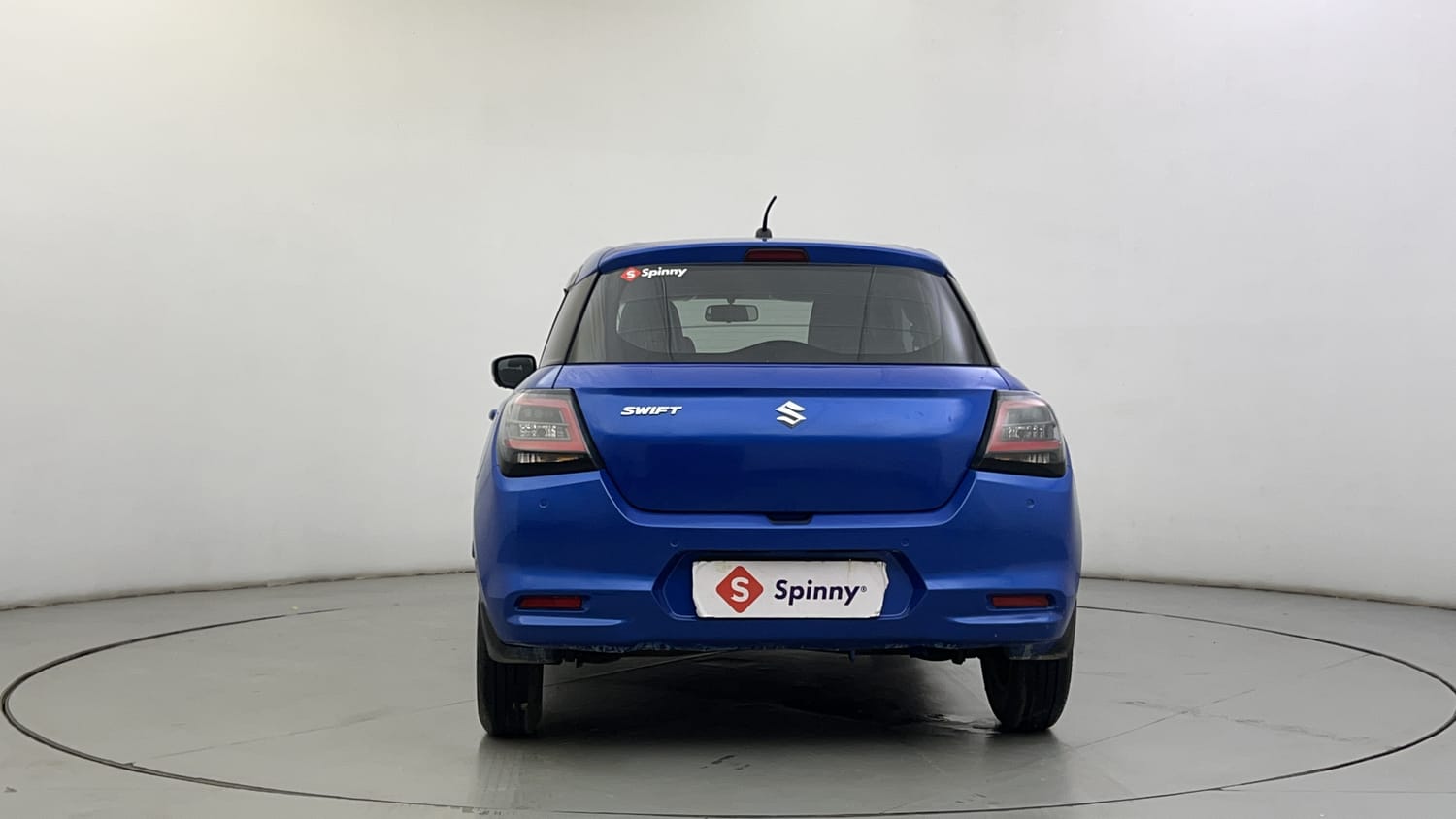 Used 2024 Maruti Suzuki Swift VXi (O) Petrol Manual exterior BACK VIEW