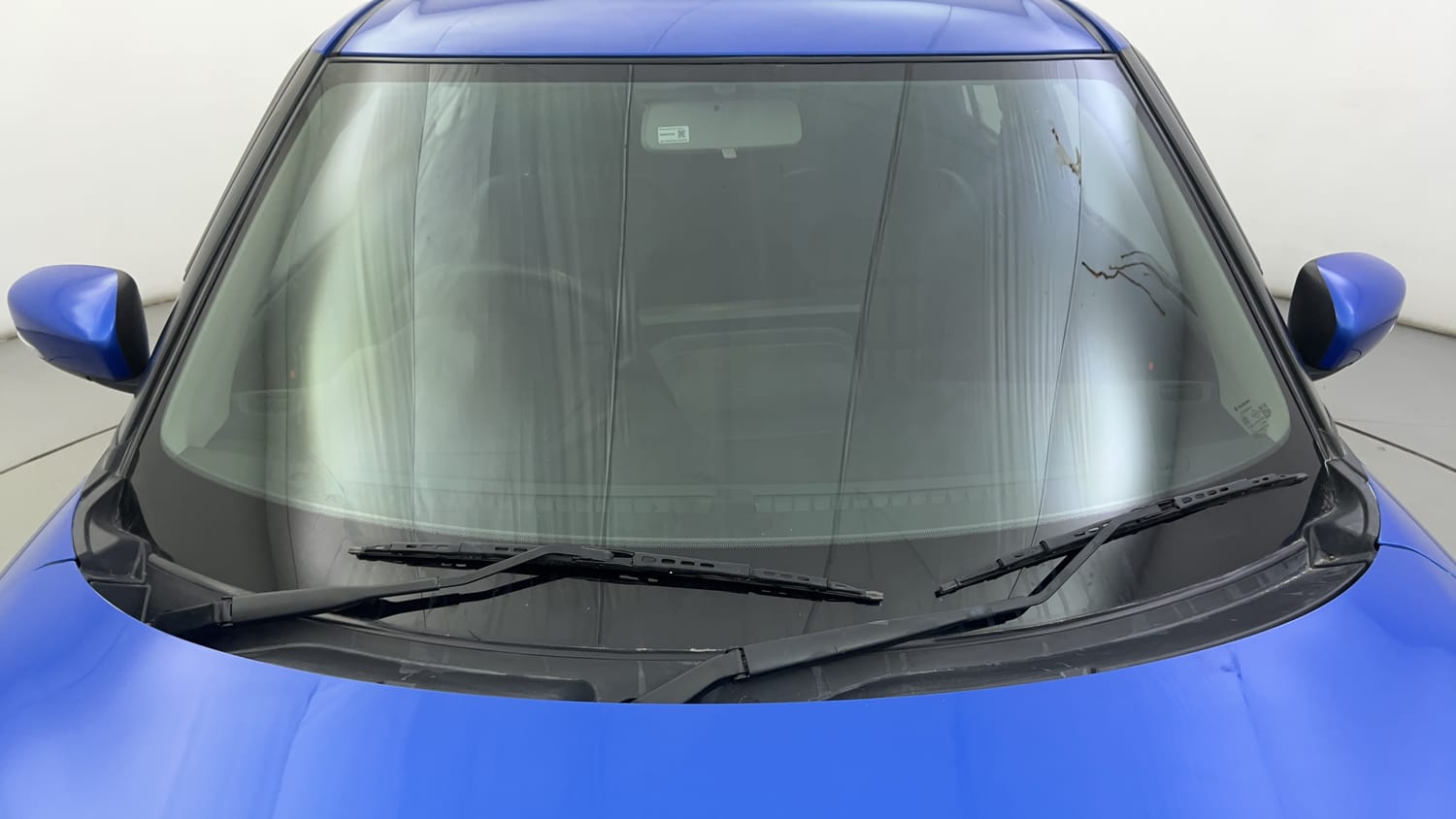 Used 2024 Maruti Suzuki Swift VXi (O) Petrol Manual exterior FRONT WINDSHIELD VIEW