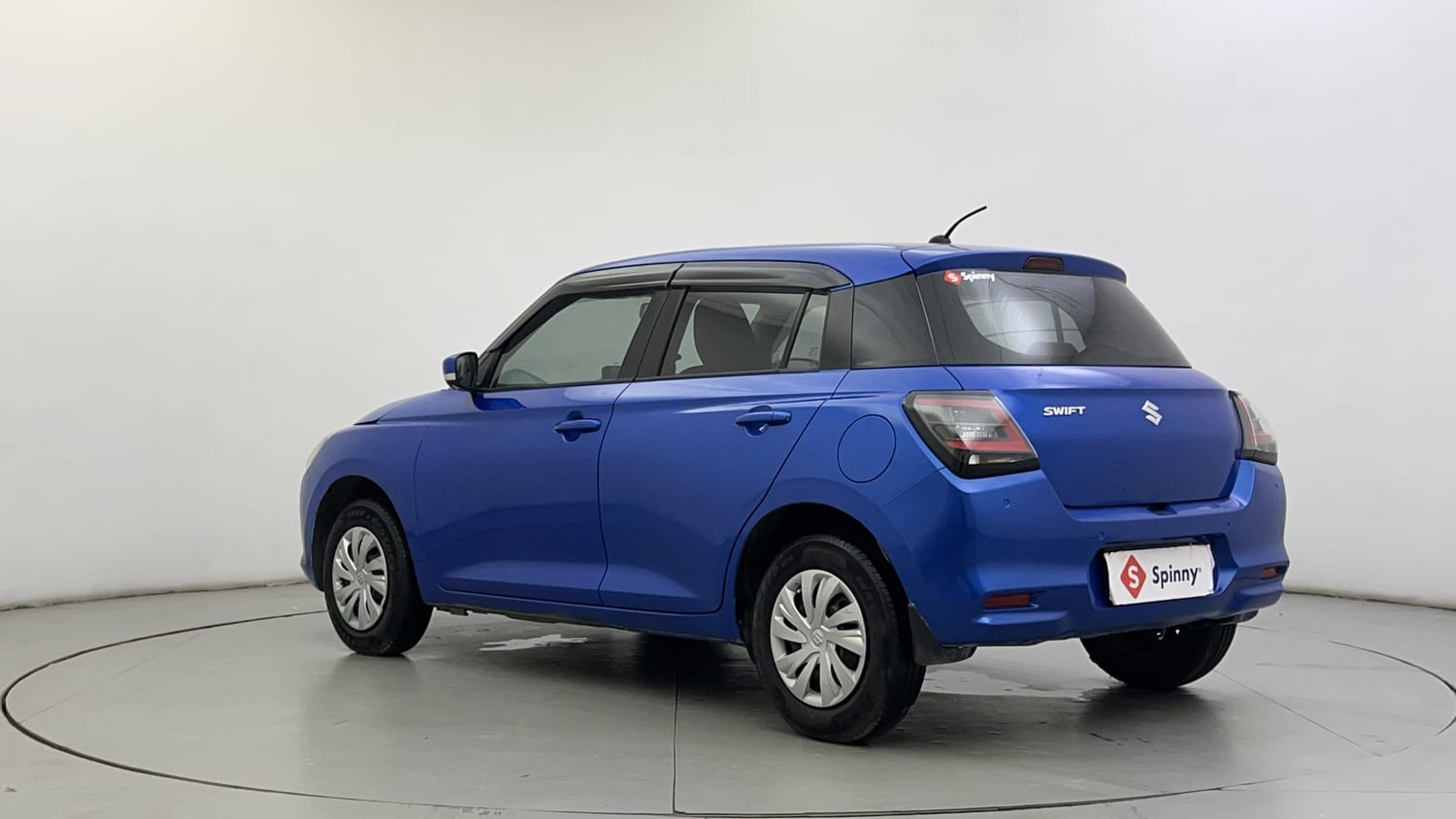 Used 2024 Maruti Suzuki Swift VXi (O) Petrol Manual exterior LEFT REAR CORNER VIEW