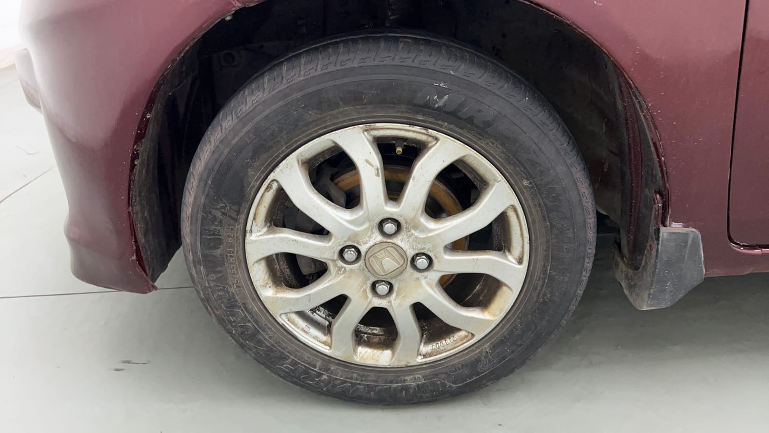 Used 2014 Honda Amaze 1.2 VX i-VTEC Petrol Manual tyres LEFT FRONT TYRE RIM VIEW