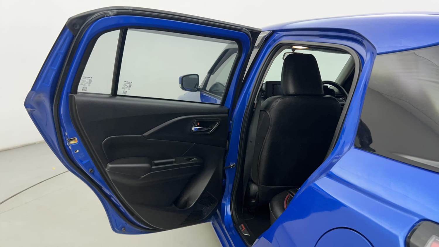 Used 2024 Maruti Suzuki Swift VXi (O) Petrol Manual interior LEFT REAR DOOR OPEN VIEW