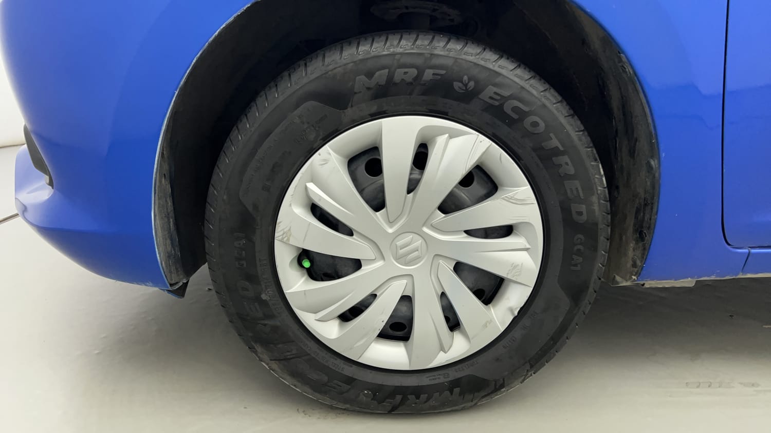 Used 2024 Maruti Suzuki Swift VXi (O) Petrol Manual tyres LEFT FRONT TYRE RIM VIEW