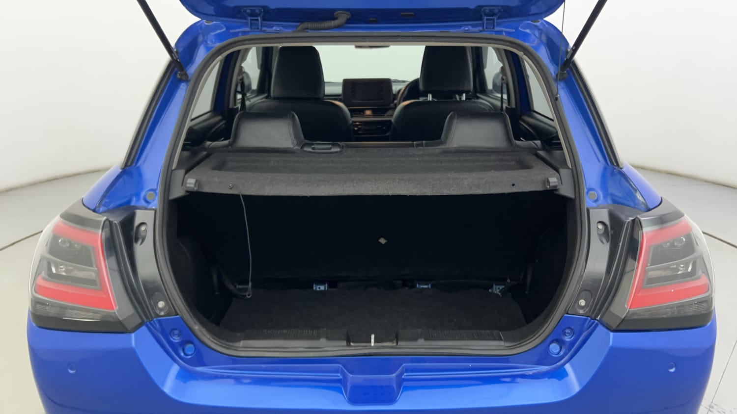 Used 2024 Maruti Suzuki Swift VXi (O) Petrol Manual interior DICKY INSIDE VIEW
