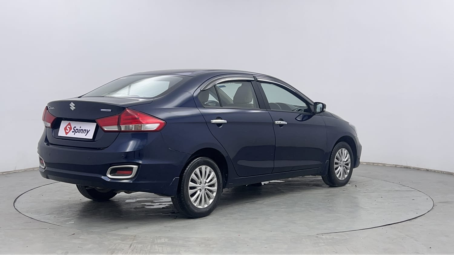 Used 2024 Maruti Suzuki Ciaz Zeta 1.5 AT Petrol Automatic exterior RIGHT REAR CORNER VIEW