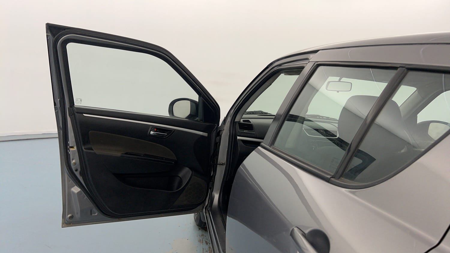 Used 2015 Maruti Suzuki Swift VXi Petrol Manual interior LEFT FRONT DOOR OPEN VIEW