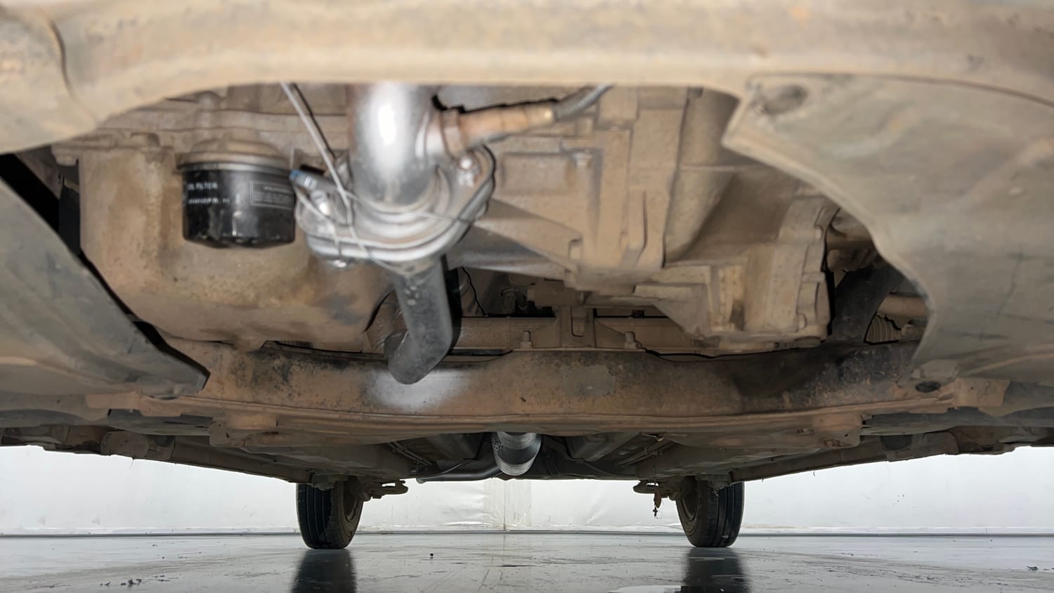 Used 2015 Maruti Suzuki Swift VXi Petrol Manual extra FRONT LEFT UNDERBODY VIEW