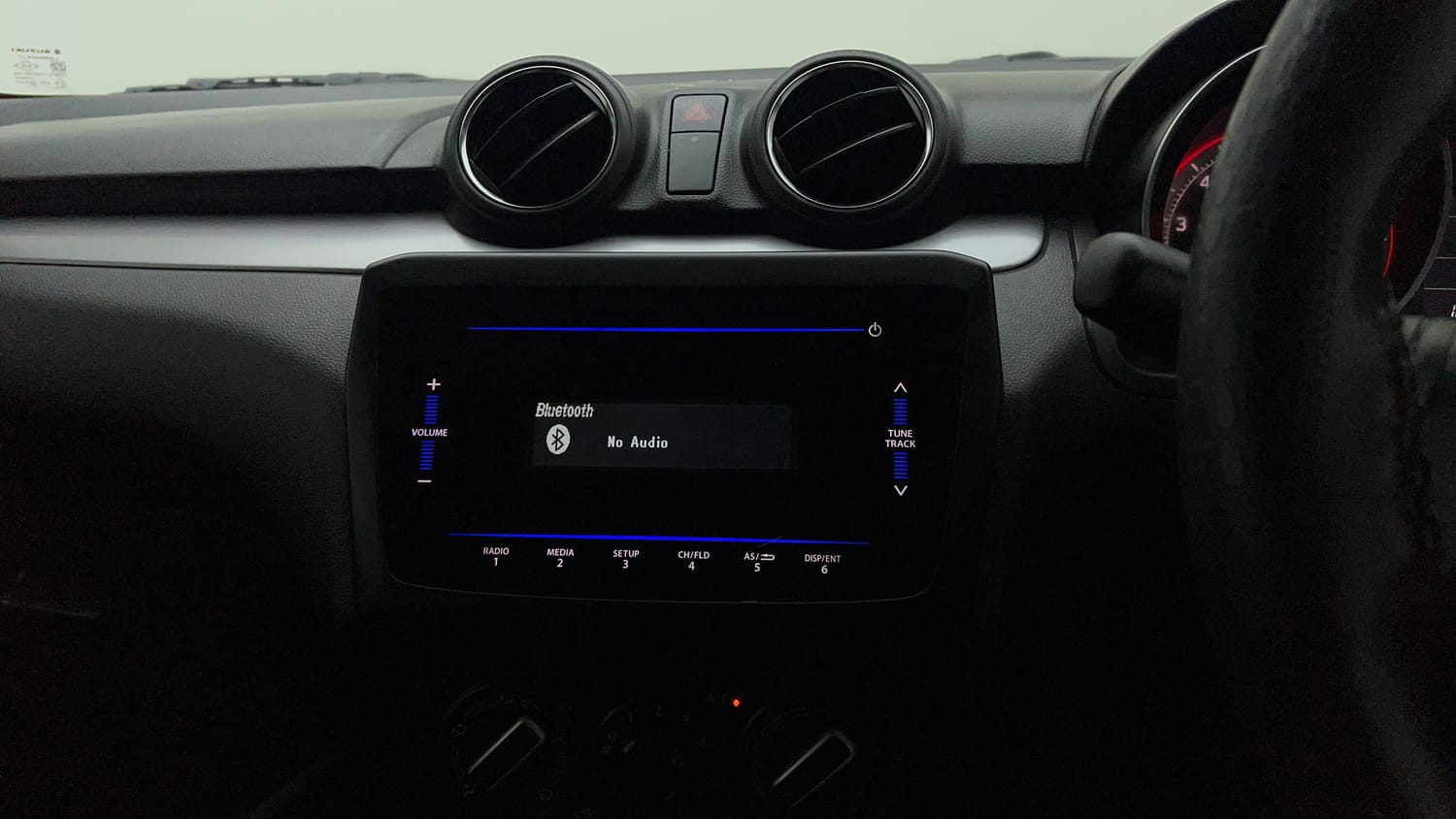 Used 2023 Maruti Suzuki Swift VXi Petrol Manual top_features Integrated (in-dash) music system