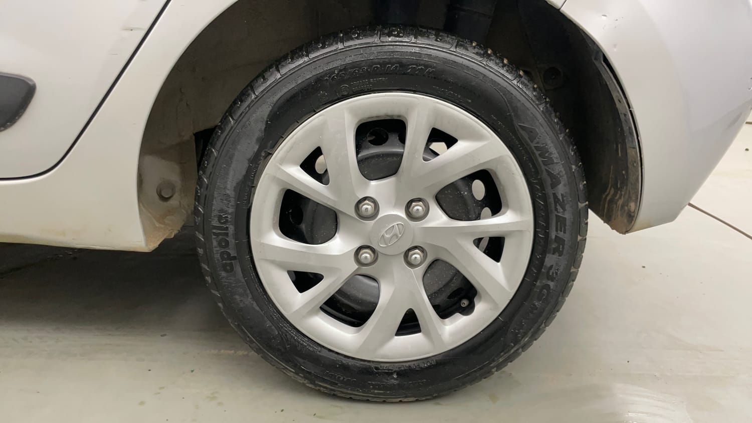 Used 2018 Hyundai Grand i10 Sportz 1.2 Kappa VTVT Petrol Manual tyres LEFT REAR TYRE RIM VIEW