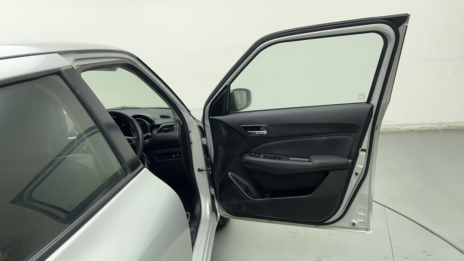 Used 2023 Maruti Suzuki Swift VXi Petrol Manual interior RIGHT FRONT DOOR OPEN VIEW