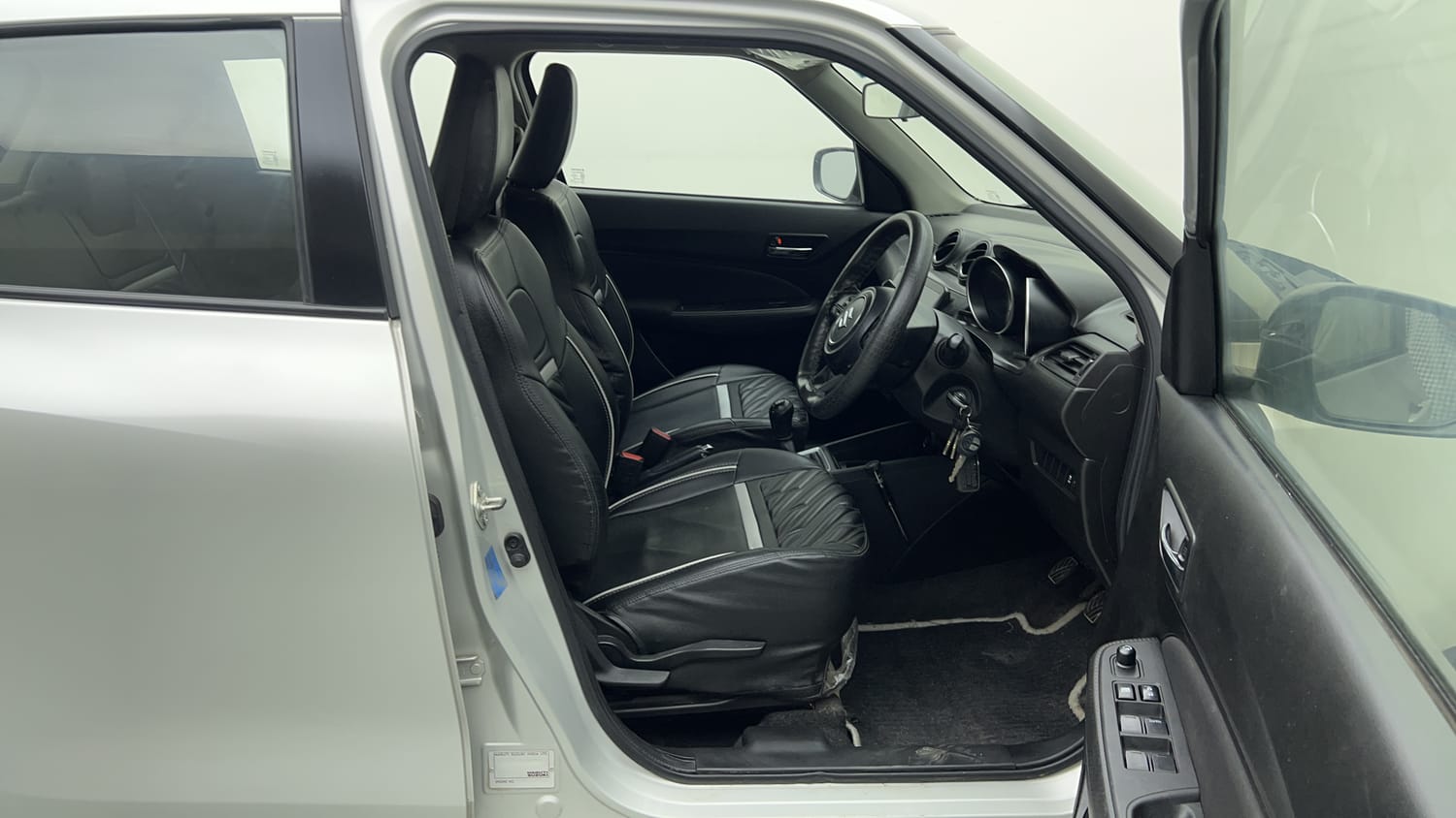 Used 2023 Maruti Suzuki Swift VXi Petrol Manual interior RIGHT SIDE FRONT DOOR CABIN VIEW