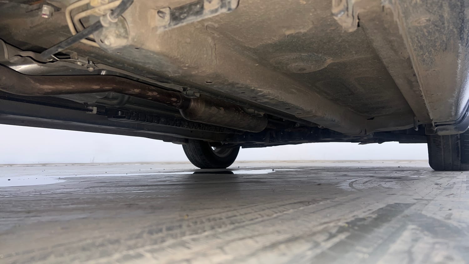 Used 2024 Maruti Suzuki Ciaz Zeta 1.5 AT Petrol Automatic extra REAR RIGHT UNDERBODY VIEW