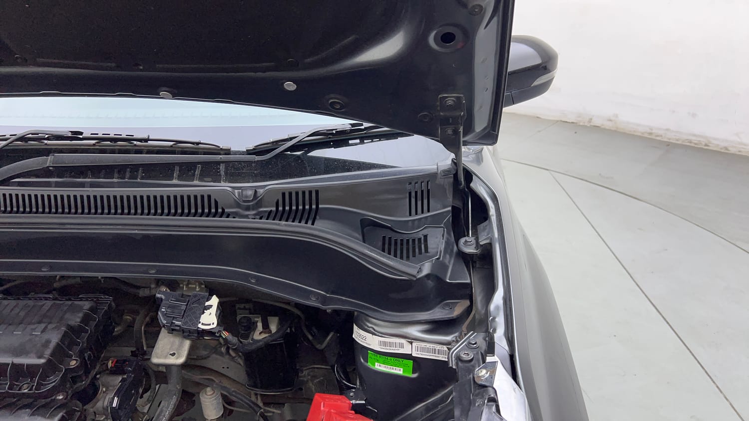 Used 2022 Tata Punch Creative Dual Tone Petrol Manual engine ENGINE LEFT SIDE HINGE & APRON VIEW