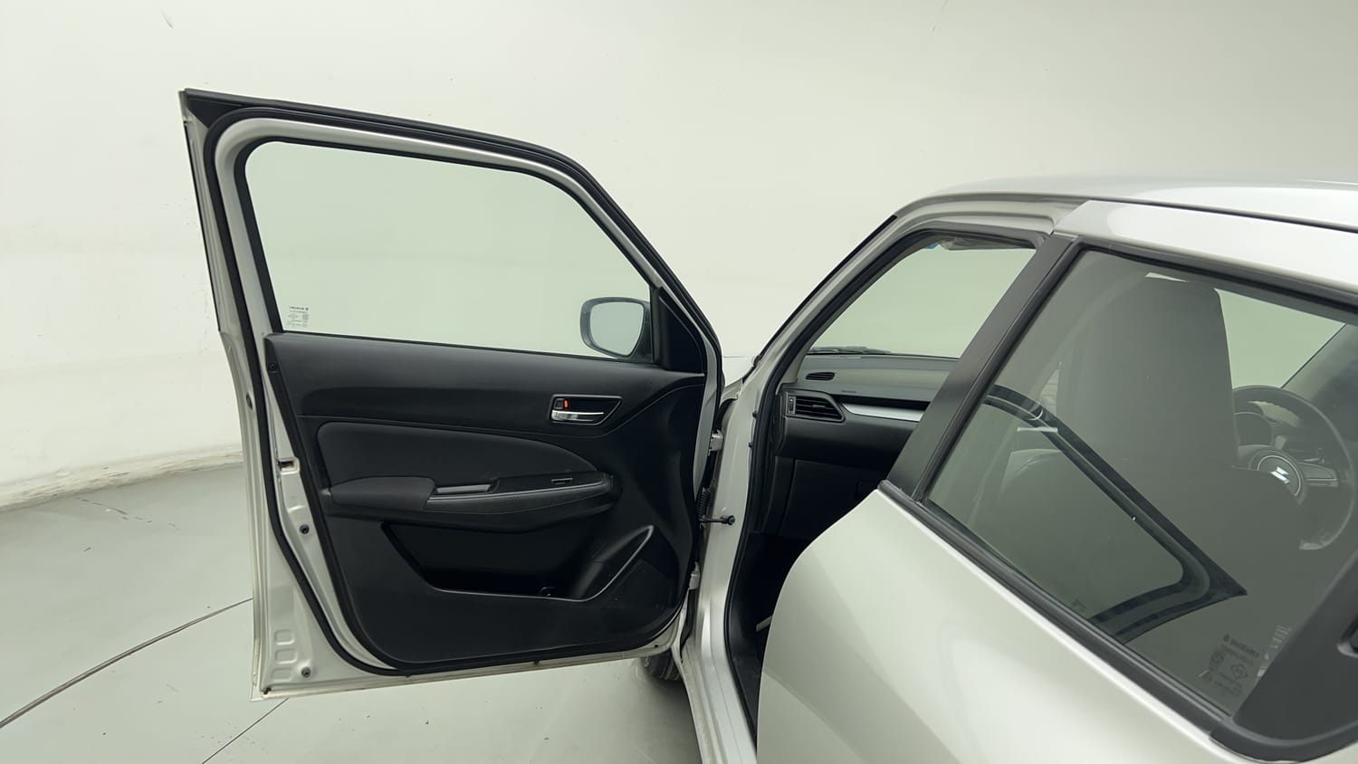 Used 2023 Maruti Suzuki Swift VXi Petrol Manual interior LEFT FRONT DOOR OPEN VIEW