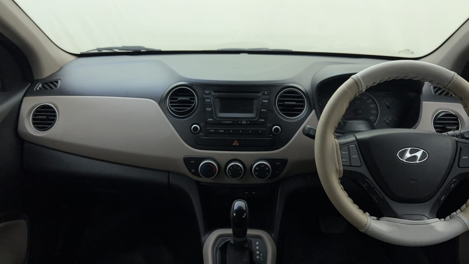 Used 2015 Hyundai Grand i10 Asta AT 1.2 Kappa VTVT Petrol Automatic interior MUSIC SYSTEM & AC CONTROL VIEW