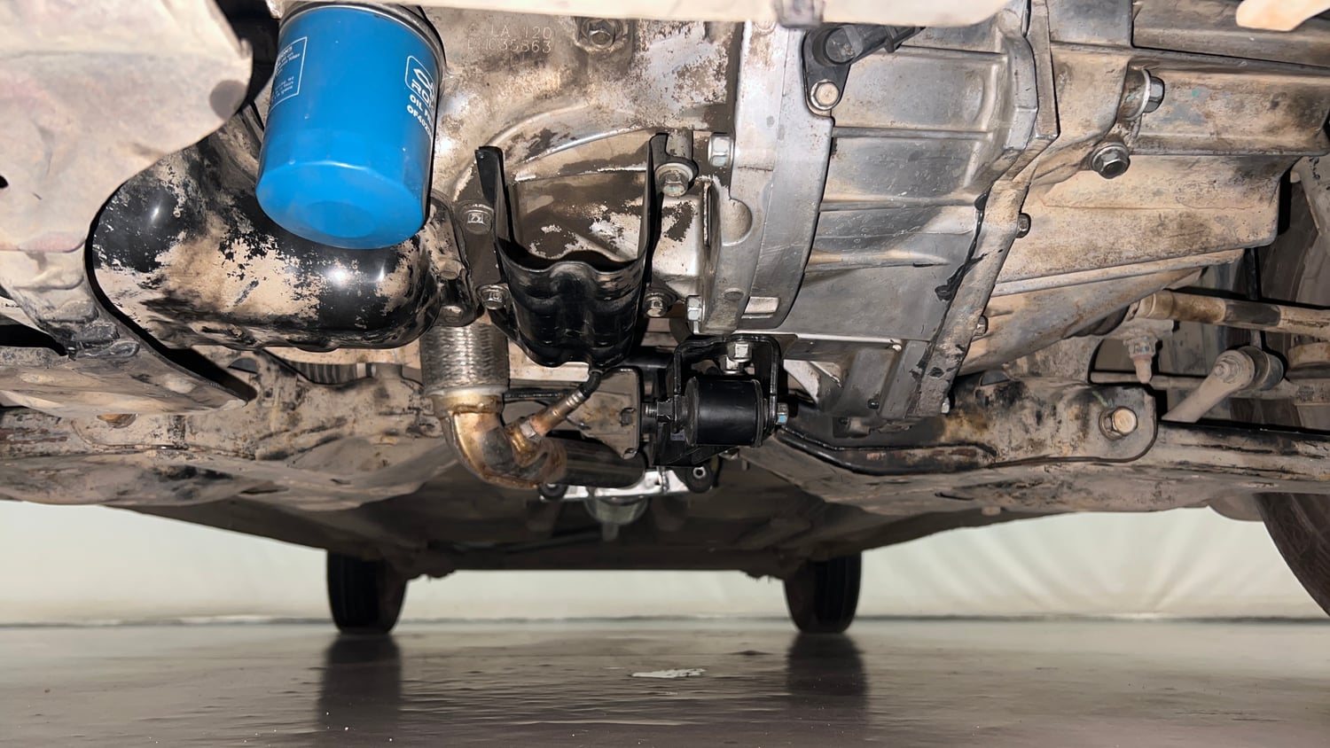 Used 2013 Hyundai i10 Sportz 1.2 Kappa2 Petrol Manual extra FRONT LEFT UNDERBODY VIEW