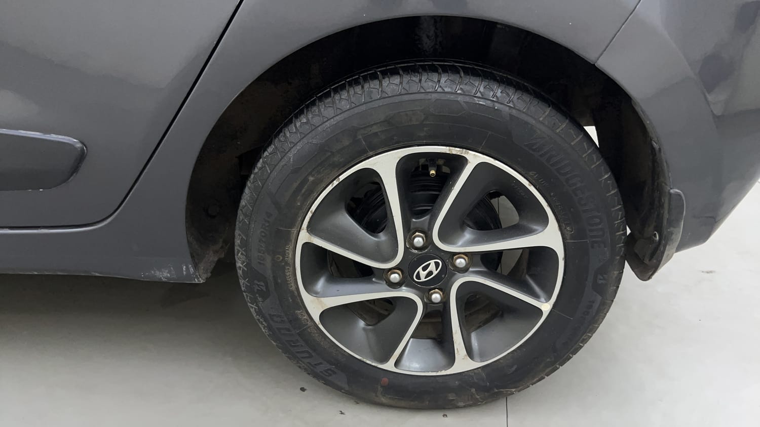 Used 2017 Hyundai Grand i10 Asta 1.2 Kappa VTVT Petrol Manual tyres LEFT REAR TYRE RIM VIEW