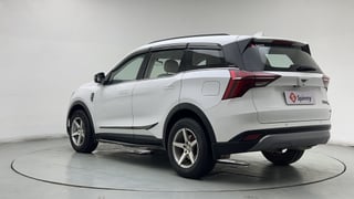 Used 2022 Mahindra XUV700 AX 3 Petrol MT 5 STR Petrol Manual exterior LEFT REAR CORNER VIEW
