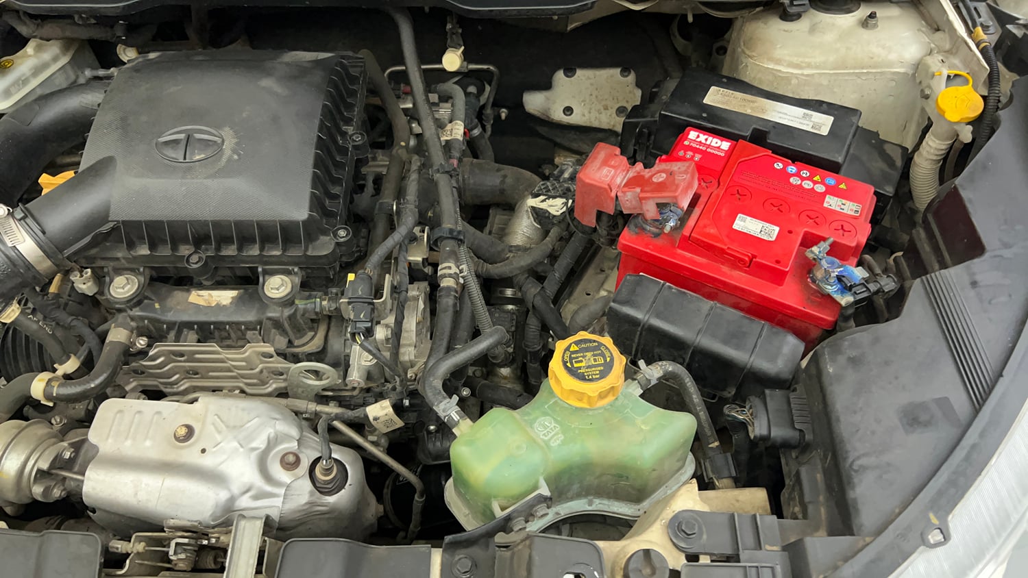 Used 2023 Tata Nexon XZA Plus (S) Petrol Automatic engine ENGINE LEFT SIDE VIEW