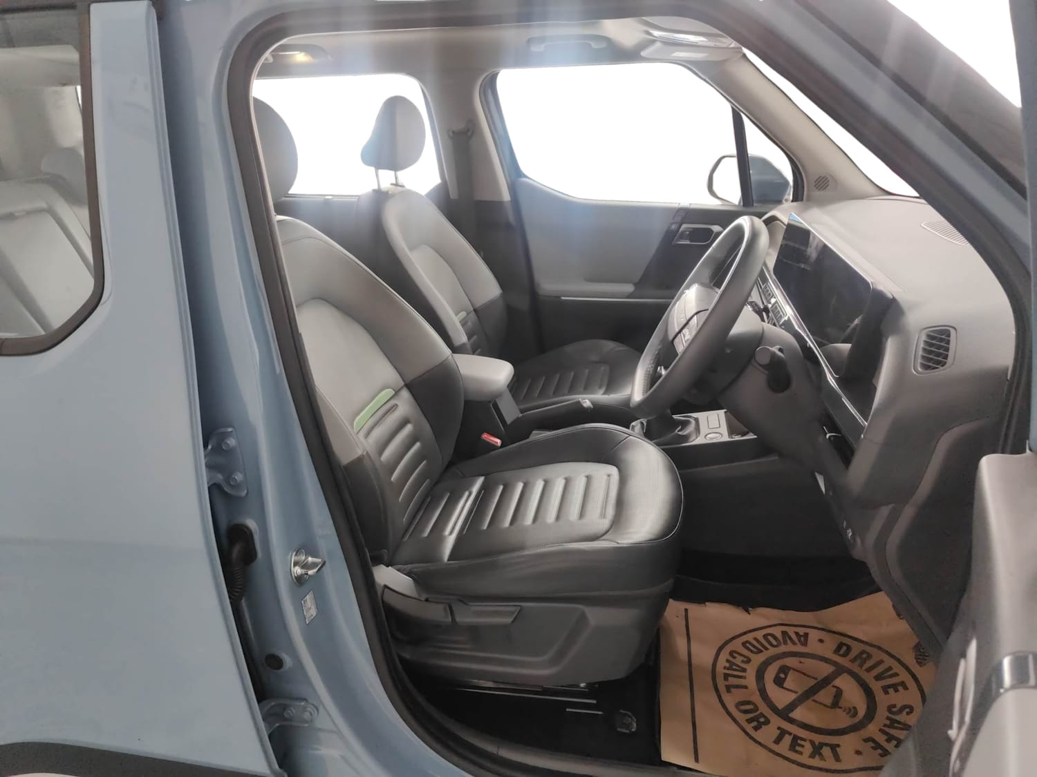 Used 2025 Kia Syros HTX 1.0 Turbo 6MT Petrol Manual interior RIGHT SIDE FRONT DOOR CABIN VIEW