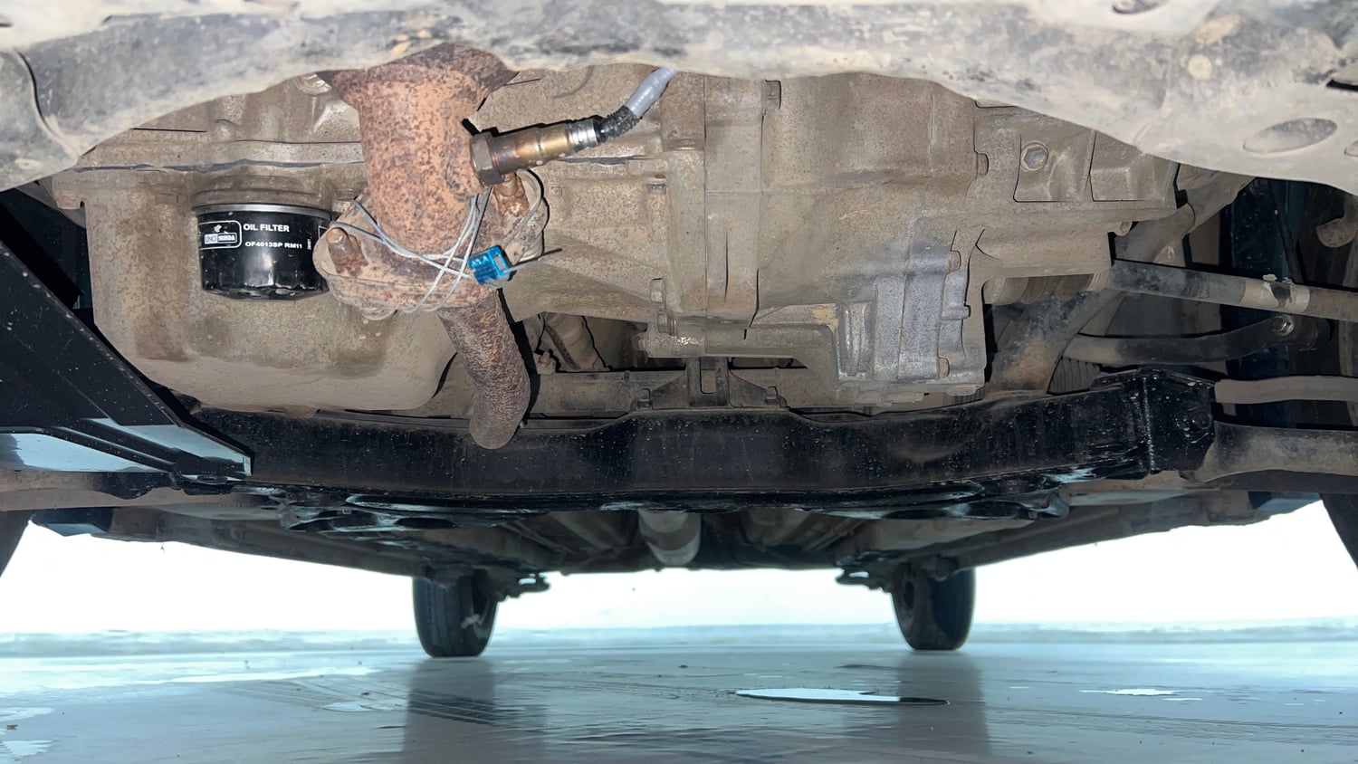 Used 2015 Maruti Suzuki Swift VXi Petrol Manual extra FRONT LEFT UNDERBODY VIEW