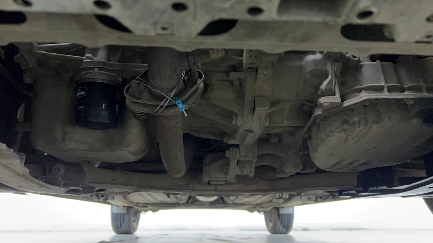 Used 2021 Maruti Suzuki Baleno Zeta Automatic Petrol Automatic extra FRONT LEFT UNDERBODY VIEW