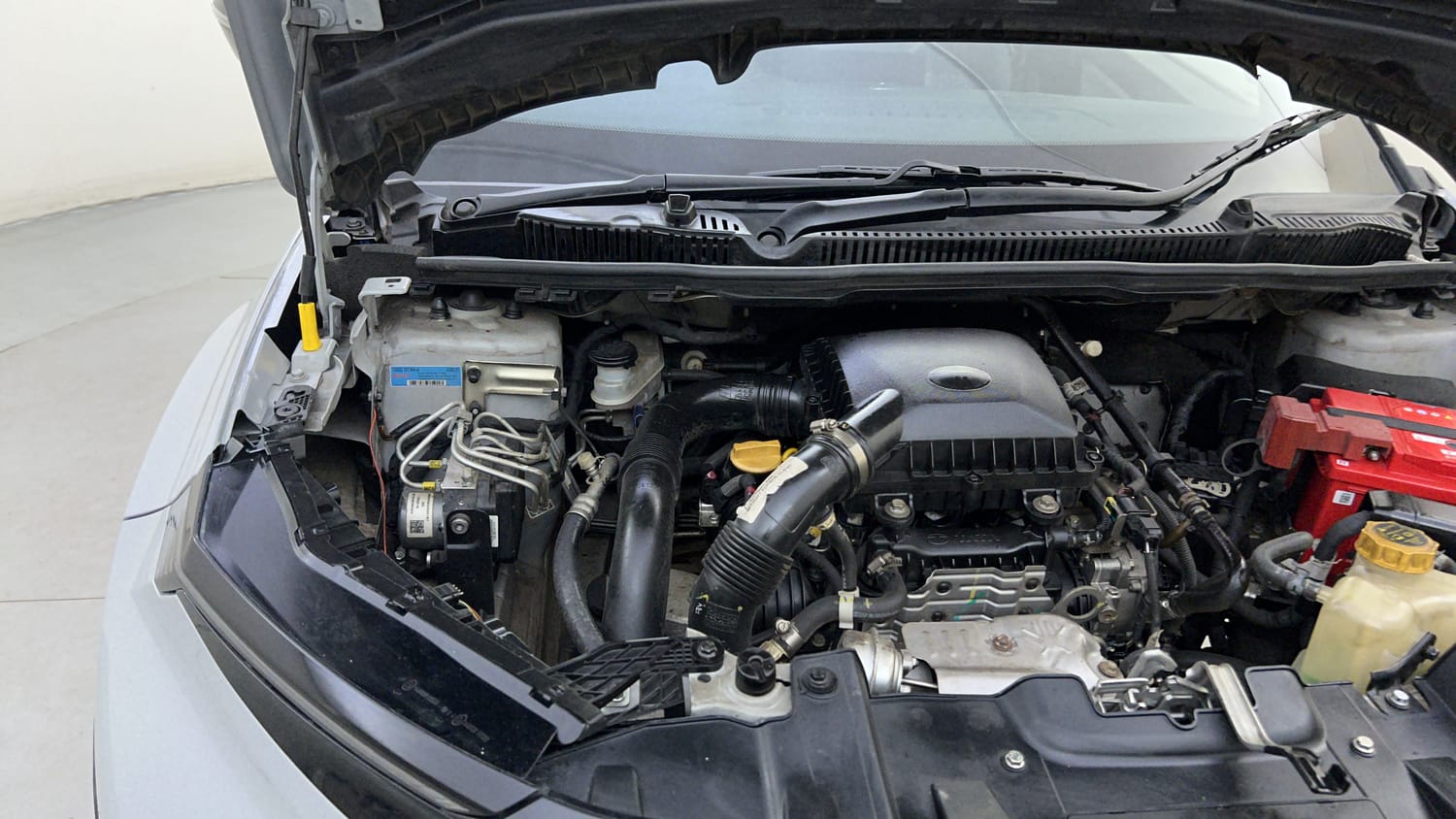 Used 2024 Tata Nexon Pure 1.2 Revotron Petrol 6MT Petrol Manual engine ENGINE RIGHT SIDE HINGE & APRON VIEW