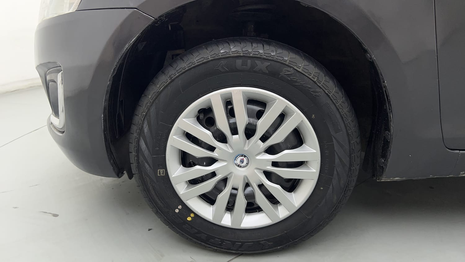 Used 2015 Maruti Suzuki Swift VXi Petrol Manual tyres LEFT FRONT TYRE RIM VIEW