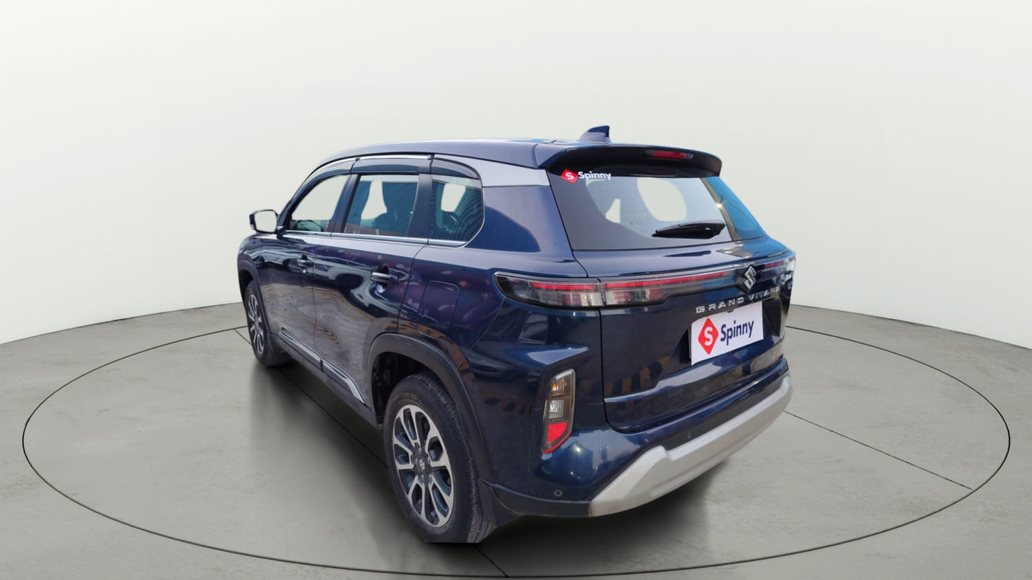 Used 2023 Maruti Suzuki Grand Vitara Zeta Smart Hybrid Petrol Manual exterior LEFT REAR CORNER VIEW