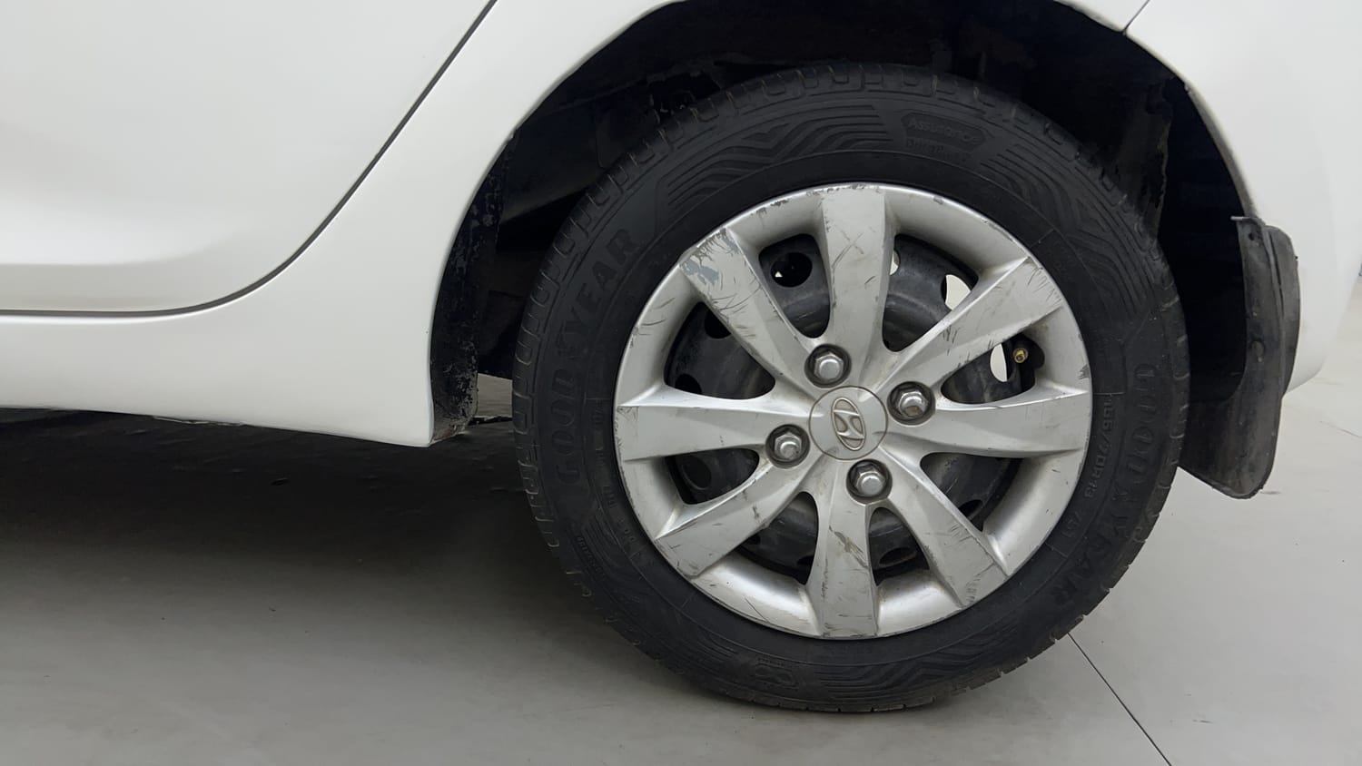 Used 2012 Hyundai Eon Magna Petrol Manual tyres LEFT REAR TYRE RIM VIEW