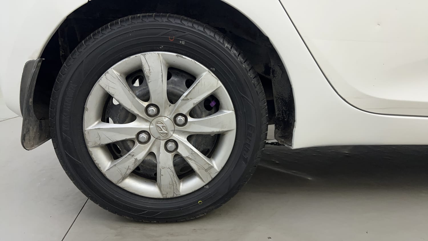 Used 2012 Hyundai Eon Magna Petrol Manual tyres RIGHT REAR TYRE RIM VIEW