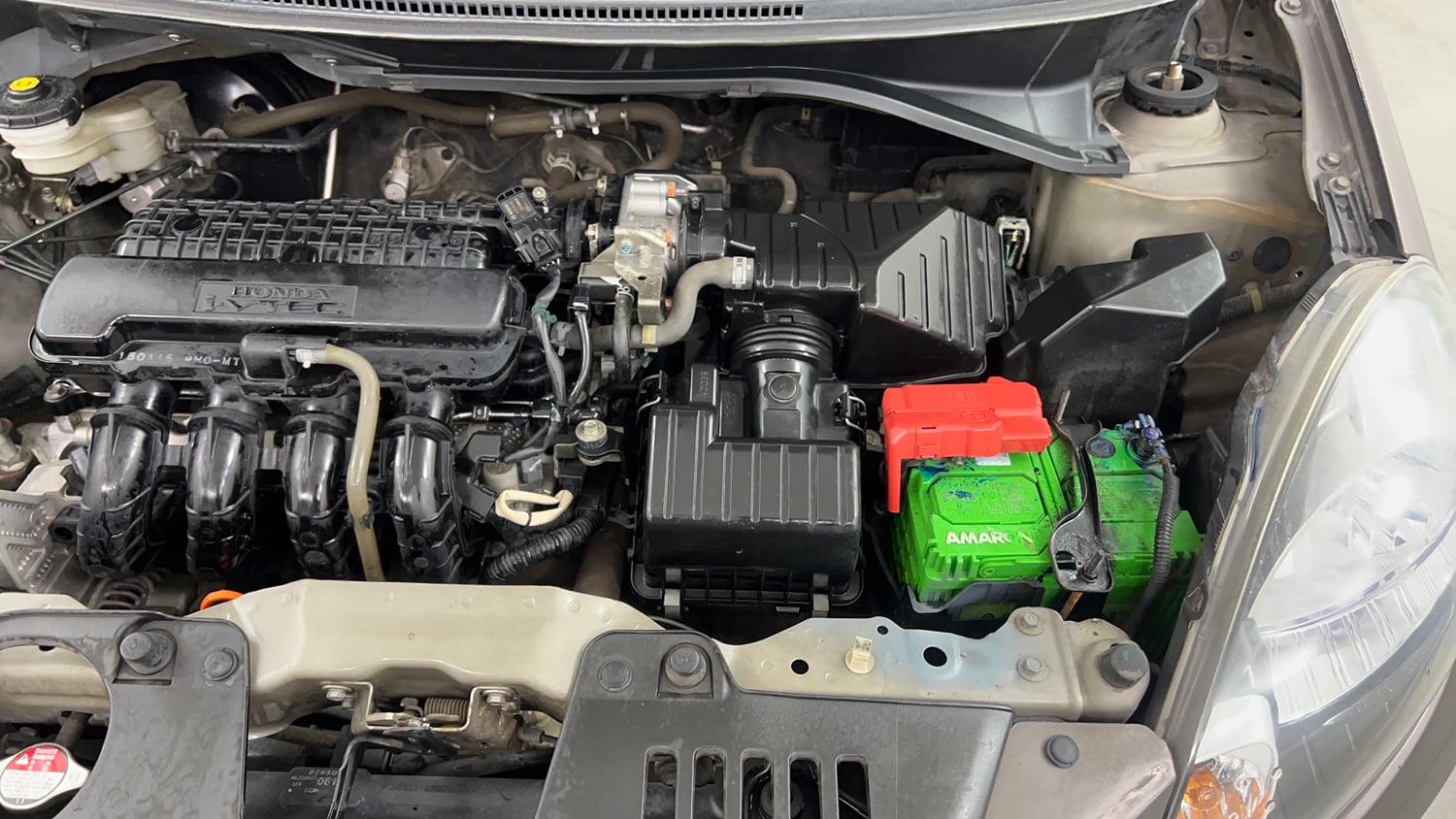 Used 2015 Honda Amaze 1.2 VX i-VTEC Petrol Manual engine ENGINE LEFT SIDE VIEW