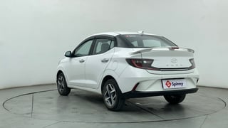 Used 2024 Hyundai Aura SX Plus 1.2 AMT Petrol Petrol Automatic exterior LEFT REAR CORNER VIEW