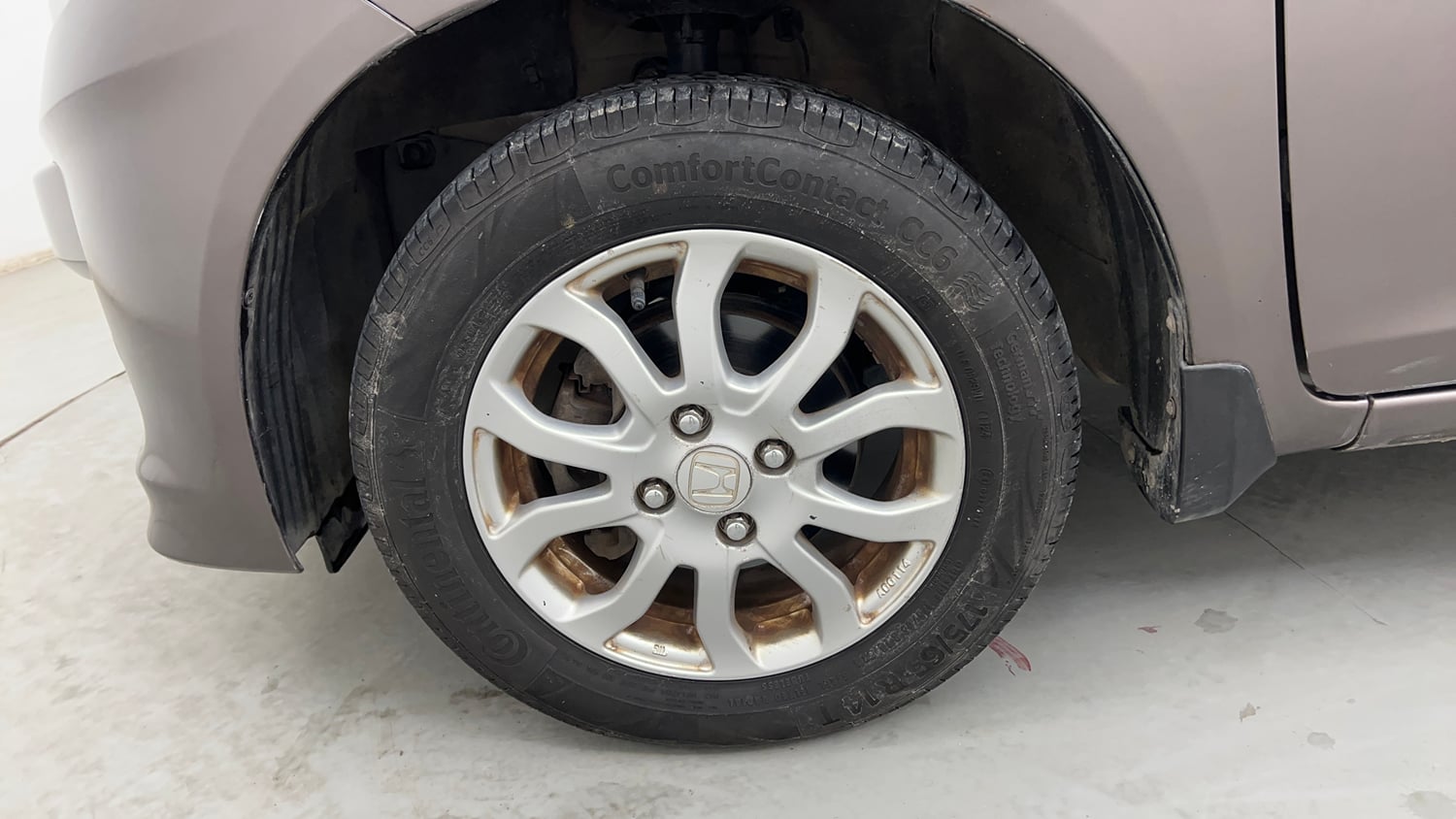 Used 2015 Honda Amaze 1.2 VX i-VTEC Petrol Manual tyres LEFT FRONT TYRE RIM VIEW