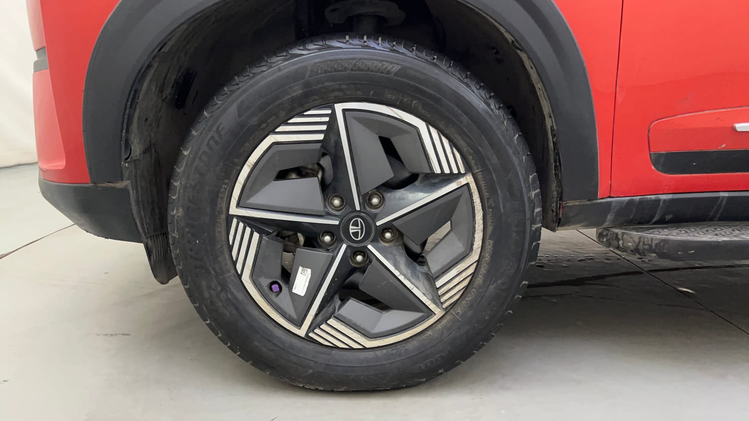 Used 2024 Tata Nexon Creative Plus S 1.2 Revotron Petrol 6MT DT Petrol Manual tyres LEFT FRONT TYRE RIM VIEW