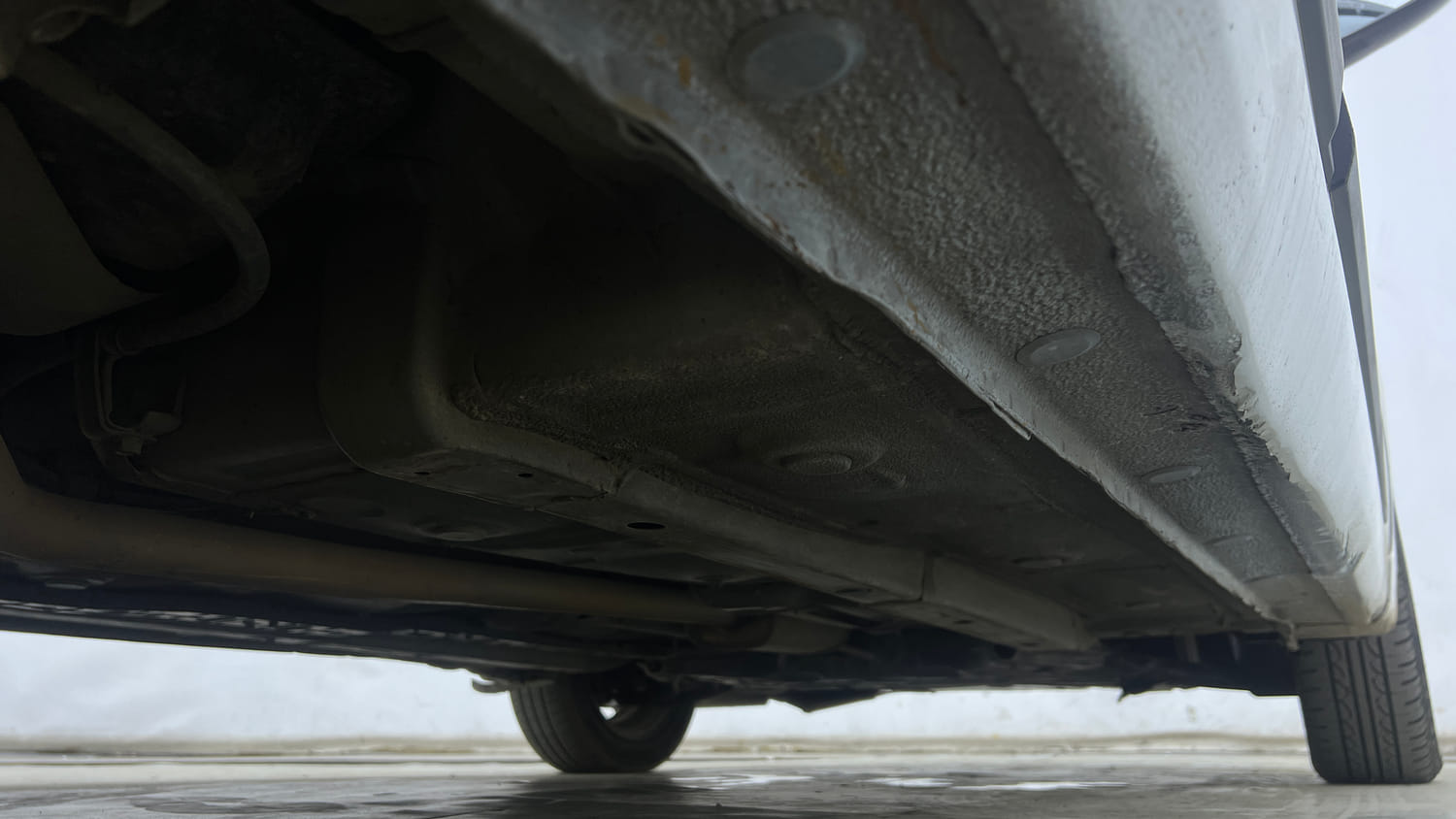 Used 2019 Hyundai Grand i10 Sportz AT 1.2 Kappa VTVT Petrol Automatic extra REAR RIGHT UNDERBODY VIEW