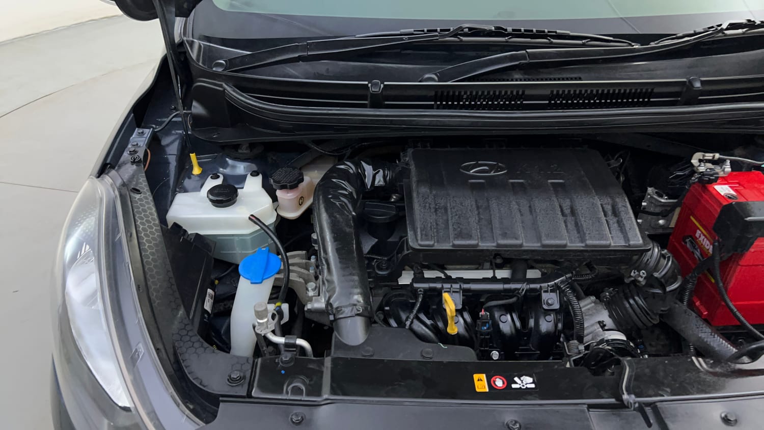 Used 2019 Hyundai Grand i10 Nios Sportz 1.2 Kappa VTVT Petrol Manual engine ENGINE RIGHT SIDE HINGE & APRON VIEW