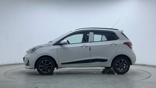 Used 2019 Hyundai Grand i10 Sportz AT 1.2 Kappa VTVT Petrol Automatic exterior LEFT SIDE VIEW