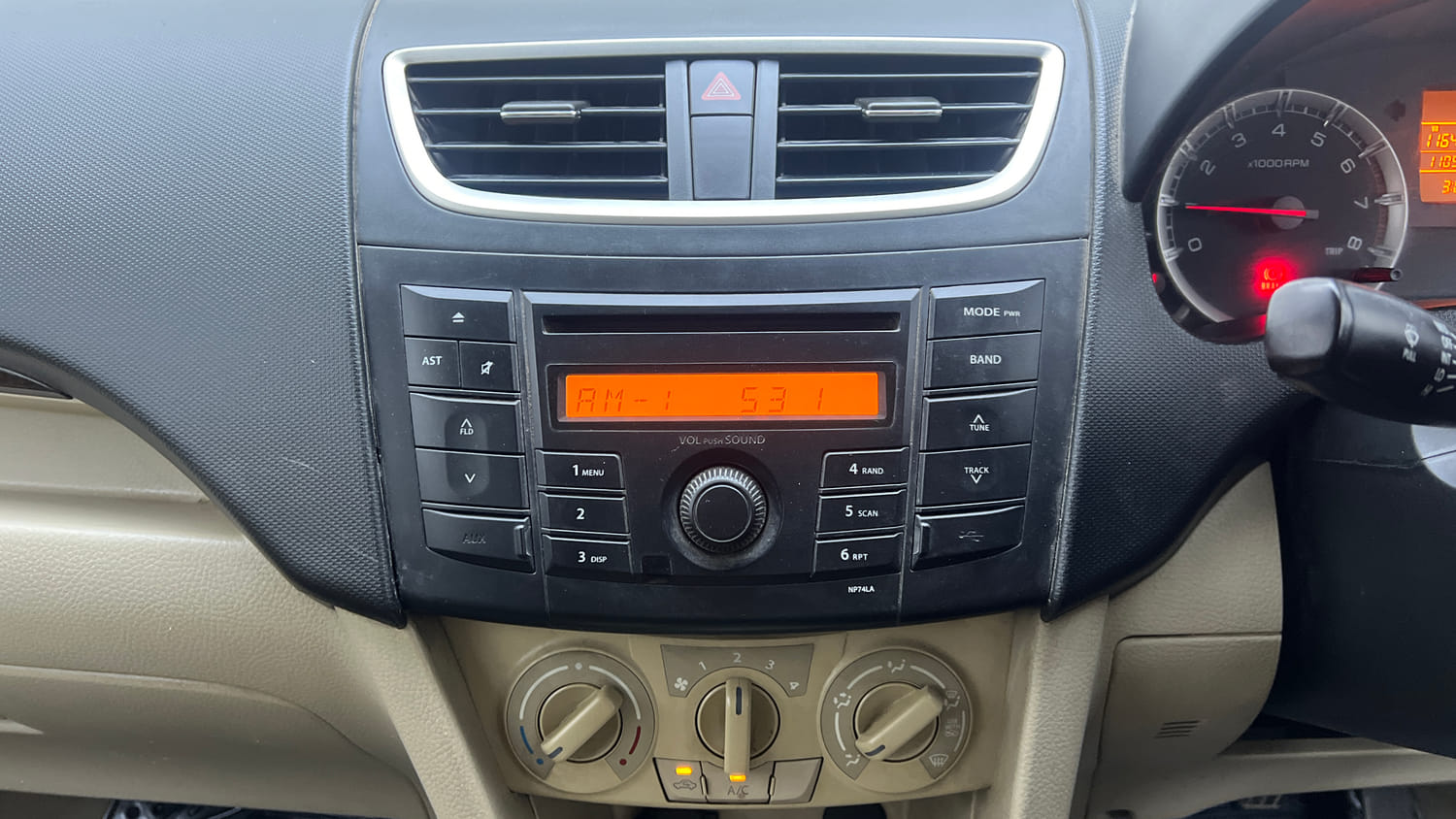 Used 2012 Maruti Suzuki Swift Dzire VXI Petrol Manual interior MUSIC SYSTEM & AC CONTROL VIEW