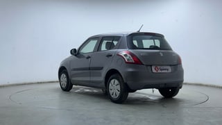 Used 2016 Maruti Suzuki Swift Lxi (O) Petrol Manual exterior LEFT REAR CORNER VIEW