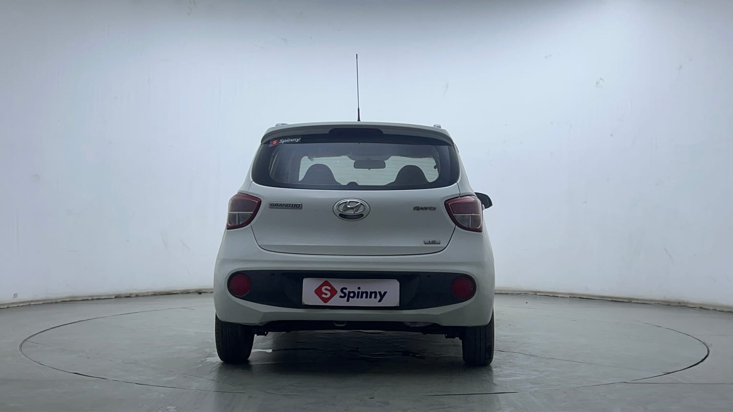 Used 2019 Hyundai Grand i10 Sportz AT 1.2 Kappa VTVT Petrol Automatic exterior BACK VIEW