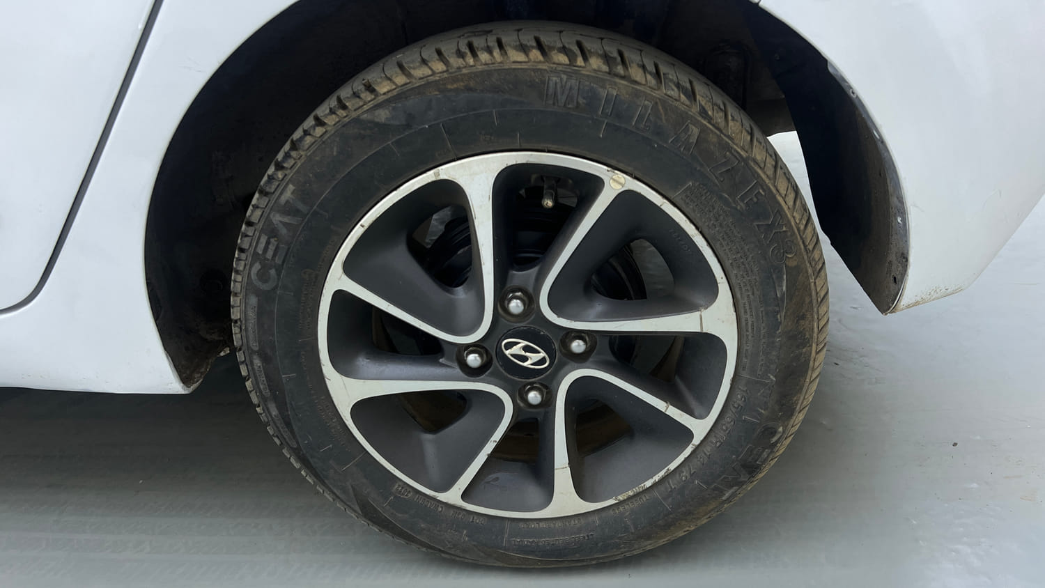 Used 2019 Hyundai Grand i10 Sportz AT 1.2 Kappa VTVT Petrol Automatic tyres LEFT REAR TYRE RIM VIEW