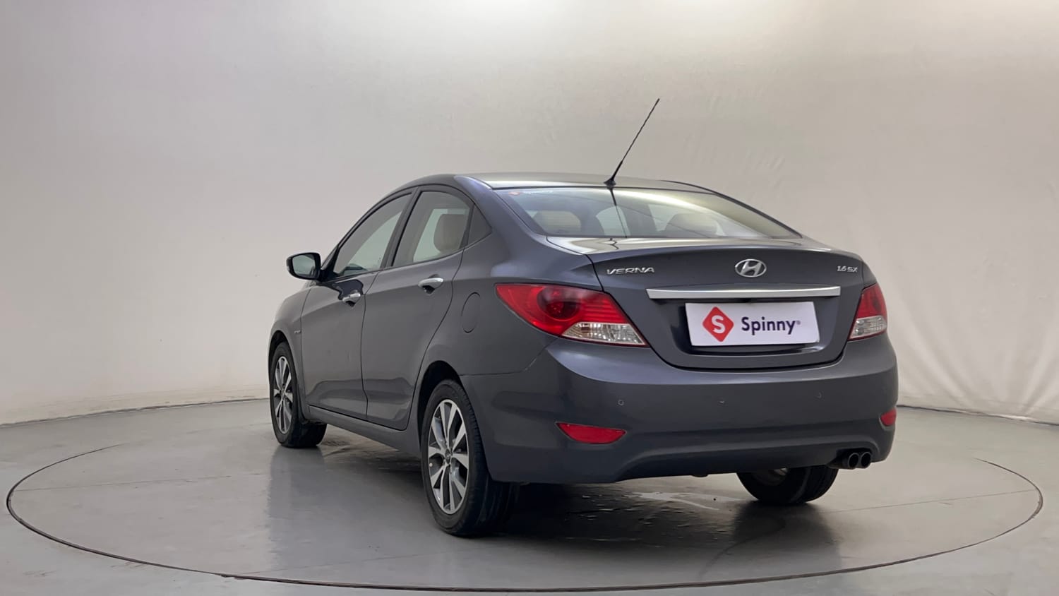 Used 2013 Hyundai Verna Fluidic 1.6 VTVT SX Opt AT Petrol Automatic exterior LEFT REAR CORNER VIEW
