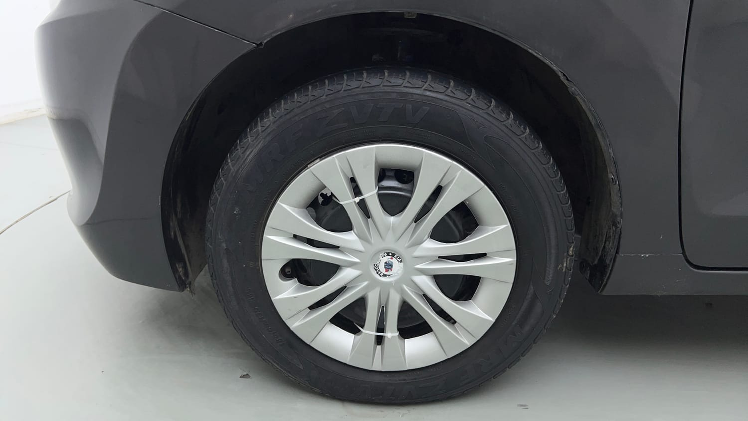Used 2018 Maruti Suzuki Baleno Delta 1.2 Petrol Manual tyres LEFT FRONT TYRE RIM VIEW