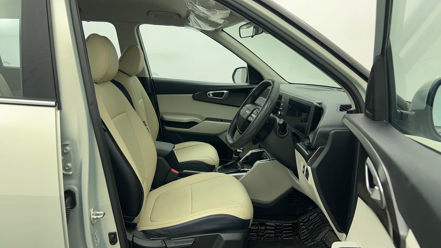 Used 2025 Kia Carens Clavis HTX Plus 1.5 Turbo Petrol 7STR DCT Petrol Automatic interior RIGHT SIDE FRONT DOOR CABIN VIEW
