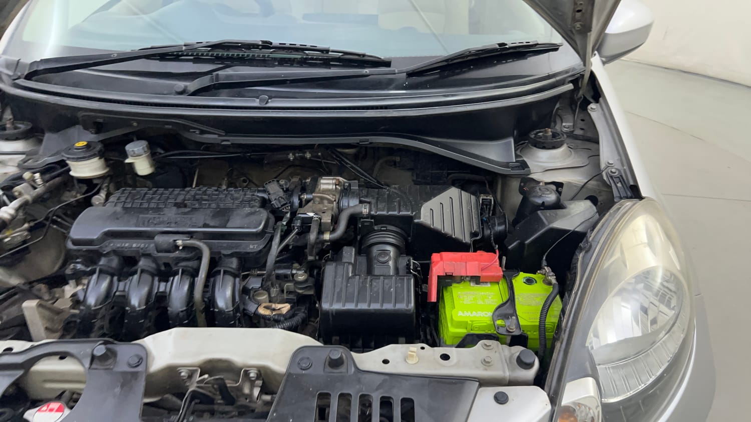 Used 2013 Honda Amaze 1.2 EX i-VTEC Petrol Manual engine ENGINE LEFT SIDE HINGE & APRON VIEW