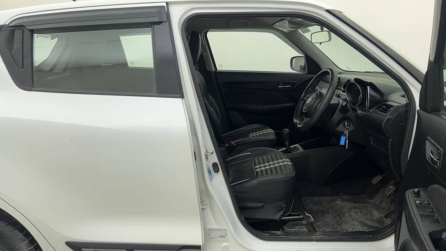 Used 2019 Maruti Suzuki Swift VXi Petrol Manual interior RIGHT SIDE FRONT DOOR CABIN VIEW