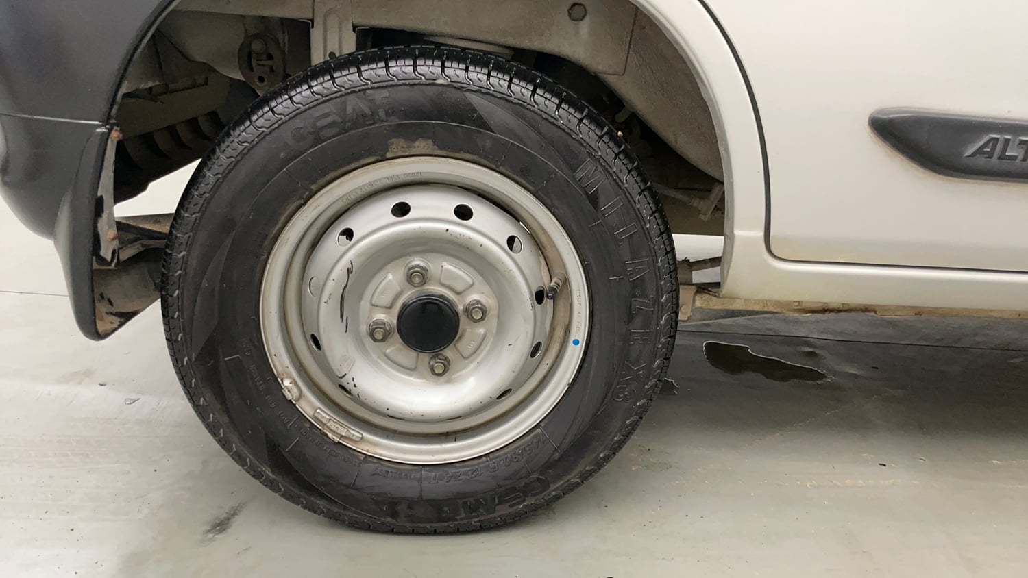 Used 2012 Maruti Suzuki Alto LXi BS-IV Petrol Manual tyres RIGHT REAR TYRE RIM VIEW