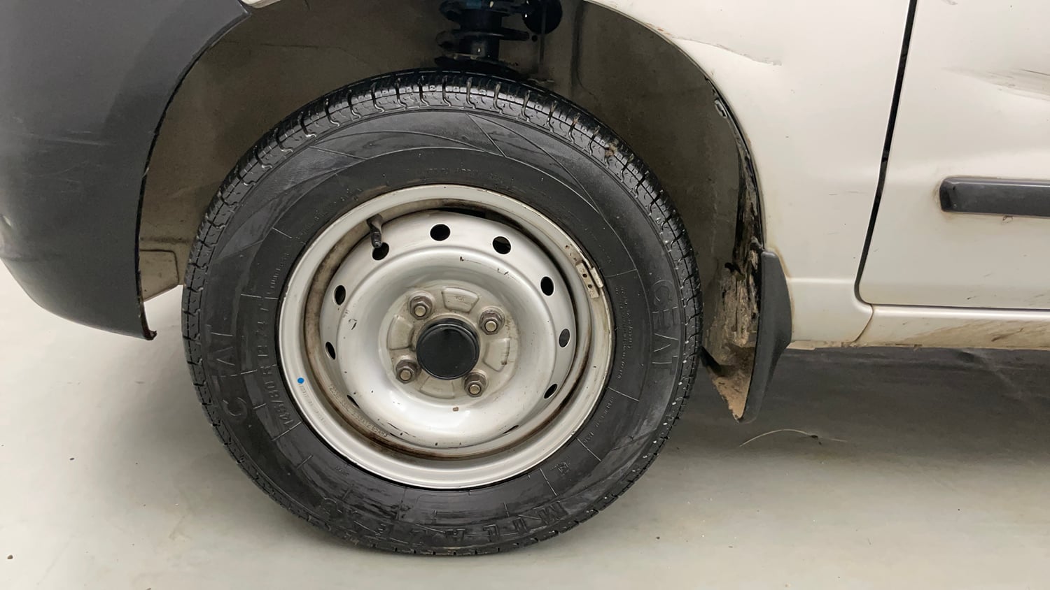 Used 2012 Maruti Suzuki Alto LXi BS-IV Petrol Manual tyres LEFT FRONT TYRE RIM VIEW