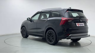 Used 2025 Mahindra XUV700 AX7 Luxury Pack Petrol AT 7 STR Ebony Limited Edition Petrol Automatic exterior LEFT REAR CORNER VIEW