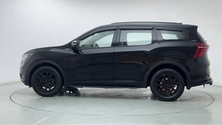 Used 2025 Mahindra XUV700 AX7 Luxury Pack Petrol AT 7 STR Ebony Limited Edition Petrol Automatic exterior LEFT SIDE VIEW